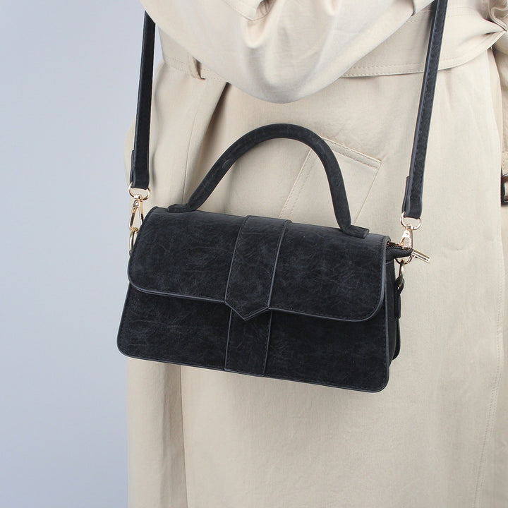 Damen elegante Handtasche im klassischen Klappdesign Nord Taschen