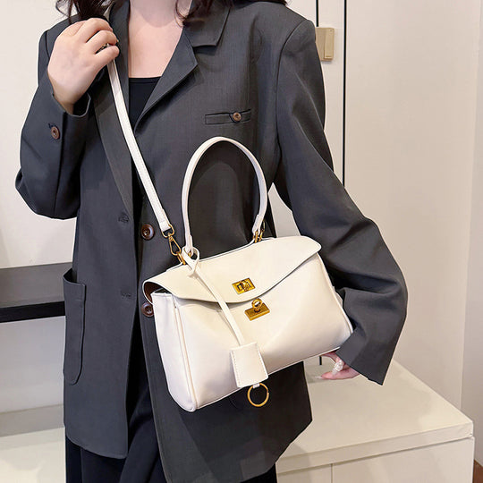 Damen modische Handtasche mit eleganter Struktur und goldenen Verzierungen | Nord Taschen