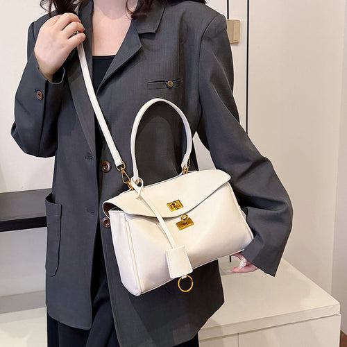 Damen modische Handtasche mit eleganter Struktur und goldenen Verzierungen | Nord Taschen