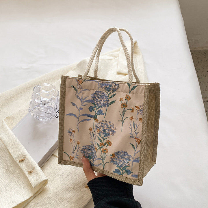 Damen Tragetasche mit floralem Dekor und robusten Materialien Nord Taschen