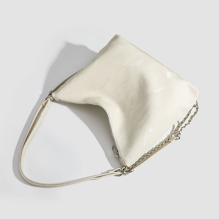 Damen Hobo-Tasche mit großzügigem Innenraum und eleganter Kettenapplikation Nord Taschen