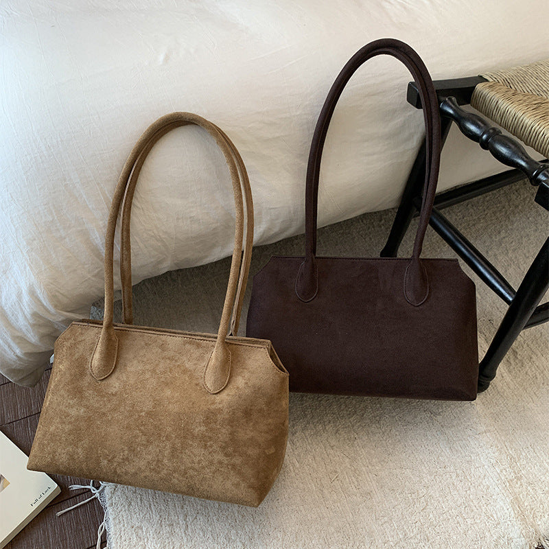 Damen elegante Handtasche aus weichem Kunstleder Nord Taschen