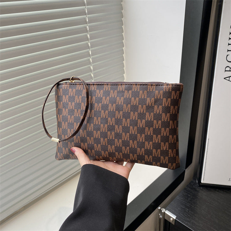 Damen Clutch mit elegantem Ringgriff Nord Taschen