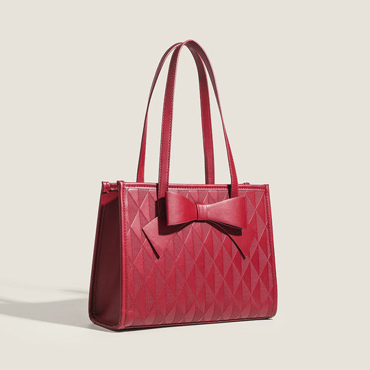 Damen Handtasche mit eleganter Diamantsteppung und dekorativem Schleifenakzent Nord Taschen