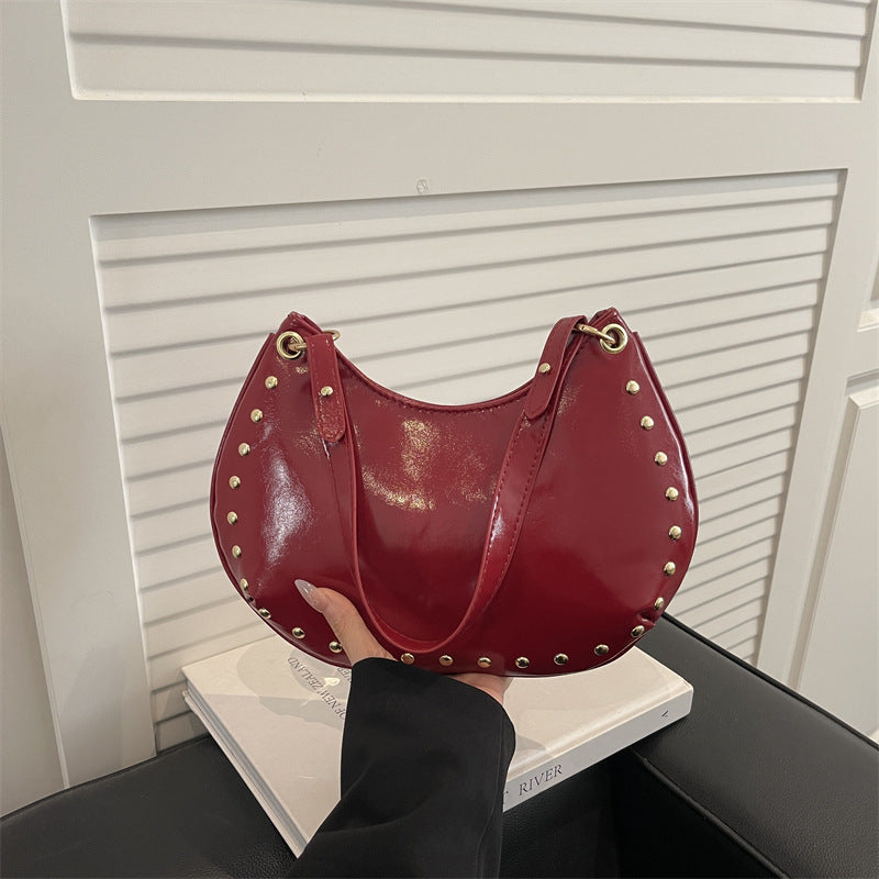 Damen elegante Schultertasche mit goldenen Nieten Nord Taschen