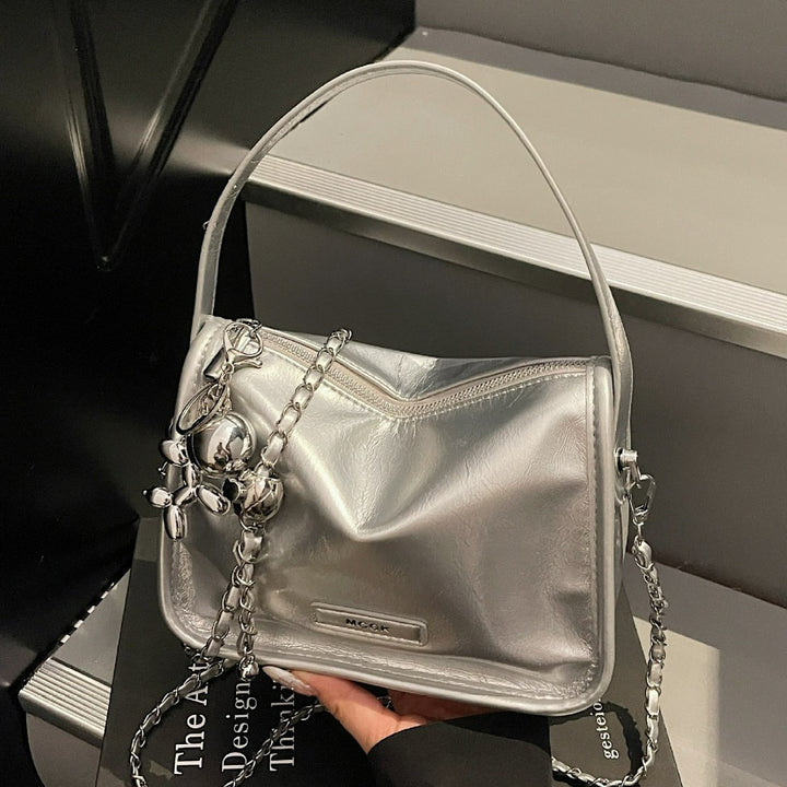 Damen Schultertasche mit glänzendem Metalliceffekt Nord Taschen