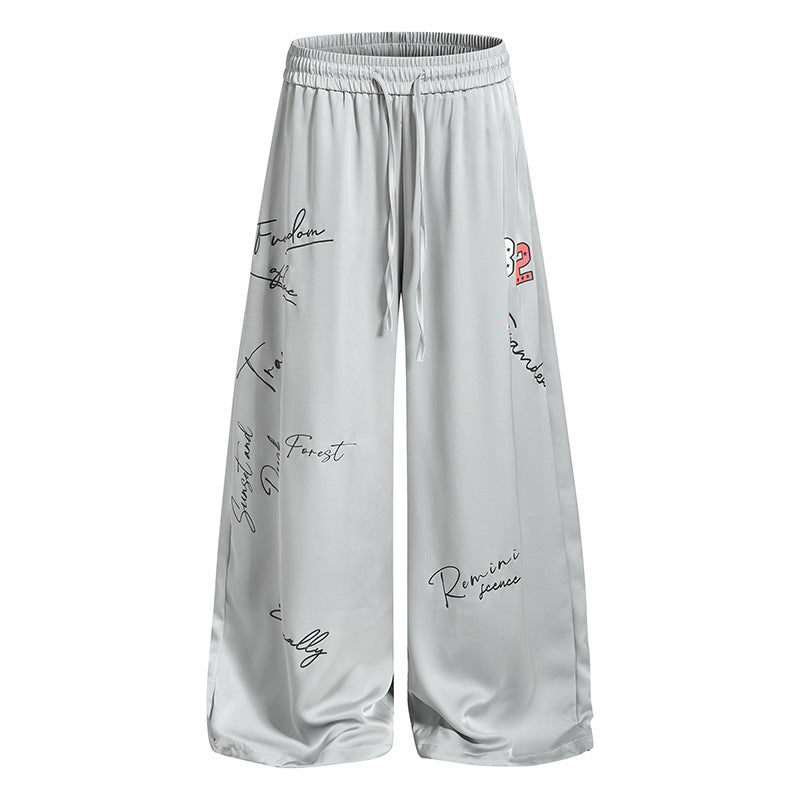 Damen Weite Satin-Palazzo-Loungehose mit Elastikbund, Kordelzug und Script-Print Nord Taschen