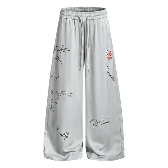 Damen Weite Satin-Palazzo-Loungehose mit Elastikbund, Kordelzug und Script-Print Nord Taschen