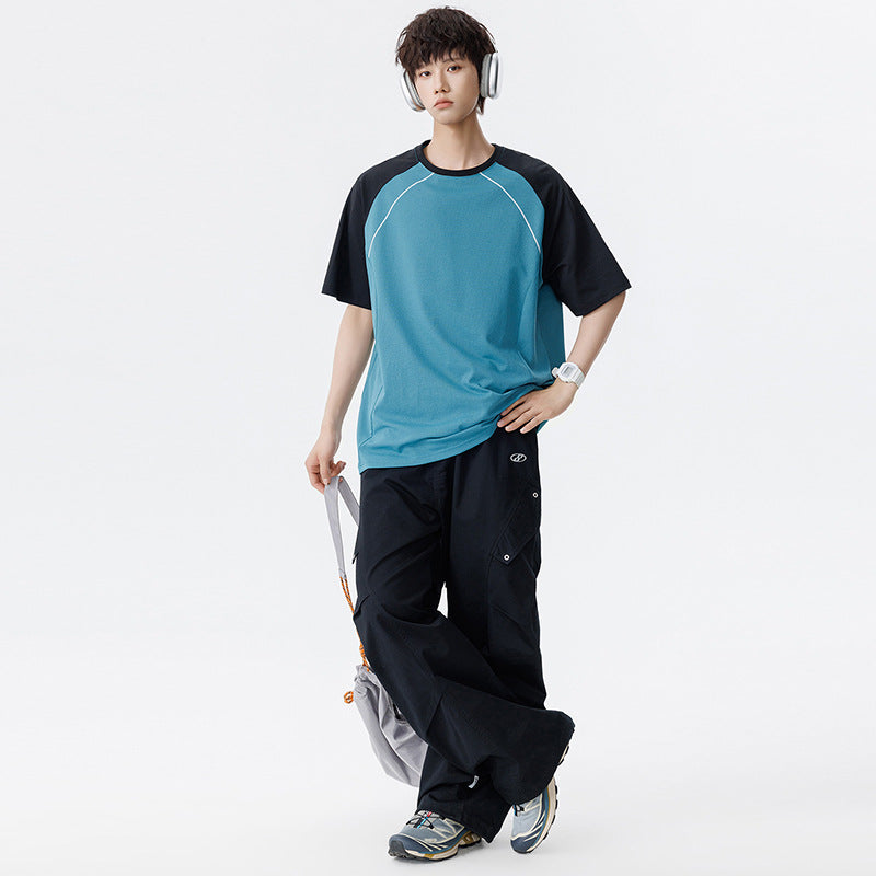Herren Sportives Oversize Waffelstruktur-Raglan-T-Shirt mit Kontrastärmeln und atmungsaktivem Funktionsjersey Nord Taschen