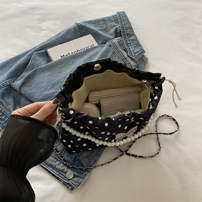 Damen Beuteltasche mit verspieltem Schmetterlingsdesign und perlenverziertem Trageriemen Nord Taschen