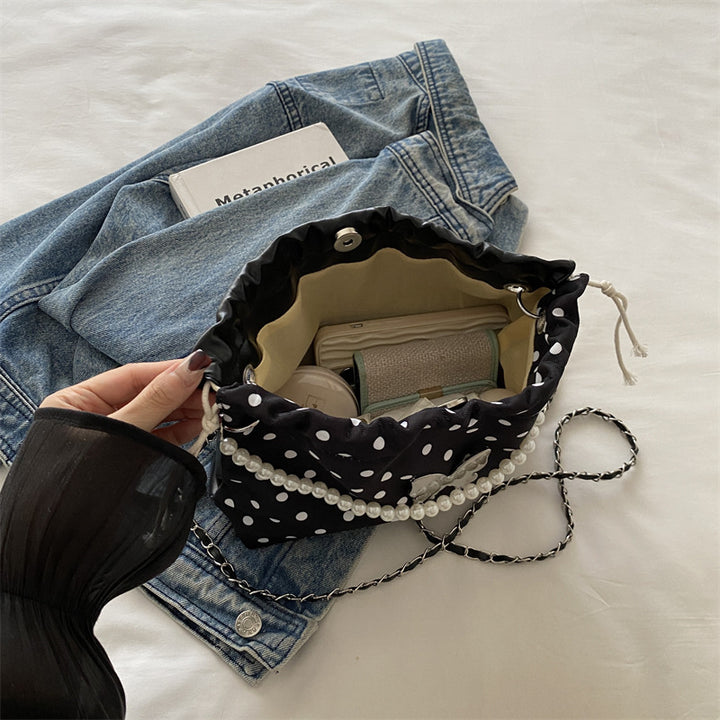 Damen Beuteltasche mit verspieltem Schmetterlingsdesign und perlenverziertem Trageriemen Nord Taschen