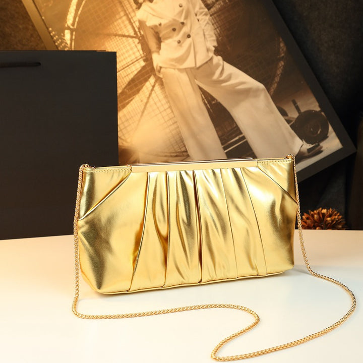 Damen Clutch mit elegantem Faltendesign und funkelnden Details Nord Taschen