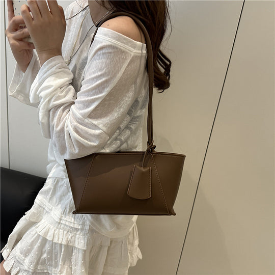 Damenhandtasche mit minimalistischer Silhouette und eleganten Details Nord Taschen