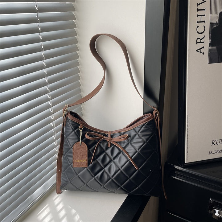 Damen elegante Umhängetasche im modernen Steppdesign Nord Taschen
