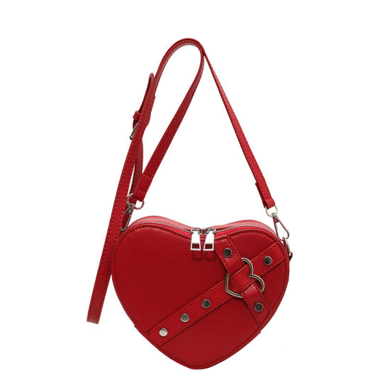 Nord Taschen | Umhängetasche für Damen - Herzförmige Crossbody-Tasche im auffälligen Design mit Riemenverschluss