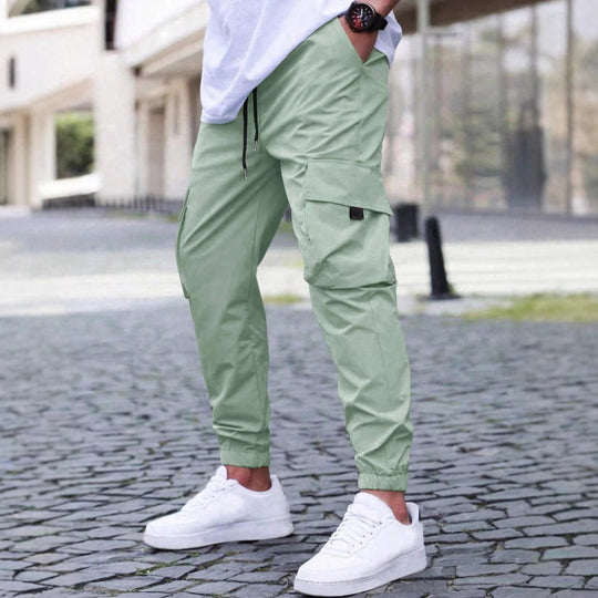 Herren technische Travel-Joggerhose mit integriertem Sicherheitsfach elastischem Tunnelzugbund und wasserabweisender Beschichtung Nord Taschen