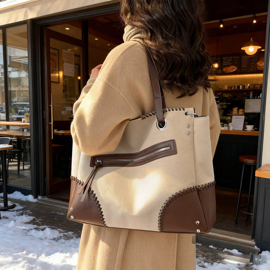 Damen elegante Handtasche mit offenen Seiten und dezenten Lederdetails Nord Taschen