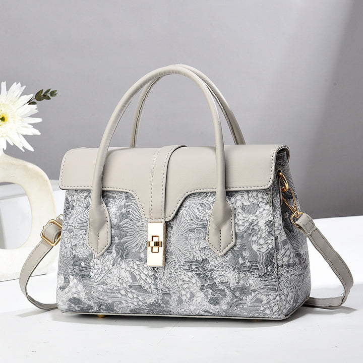 Damen elegante Handtasche mit kunstvollem floralen Design Nord Taschen