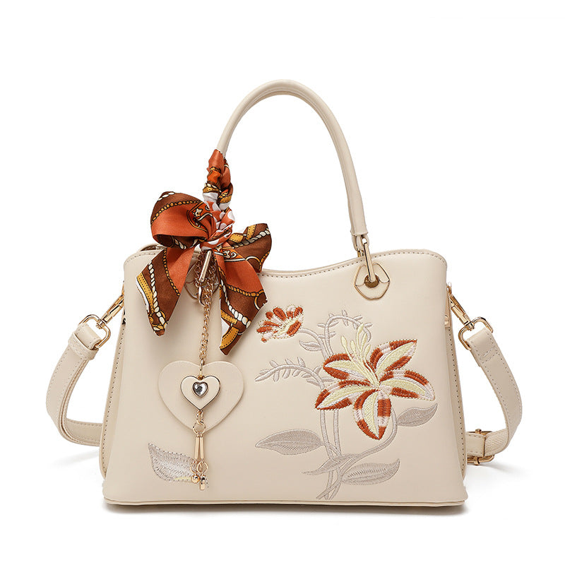 Damen elegante Handtasche mit floralem Stickdesign und modischem Schal Nord Taschen