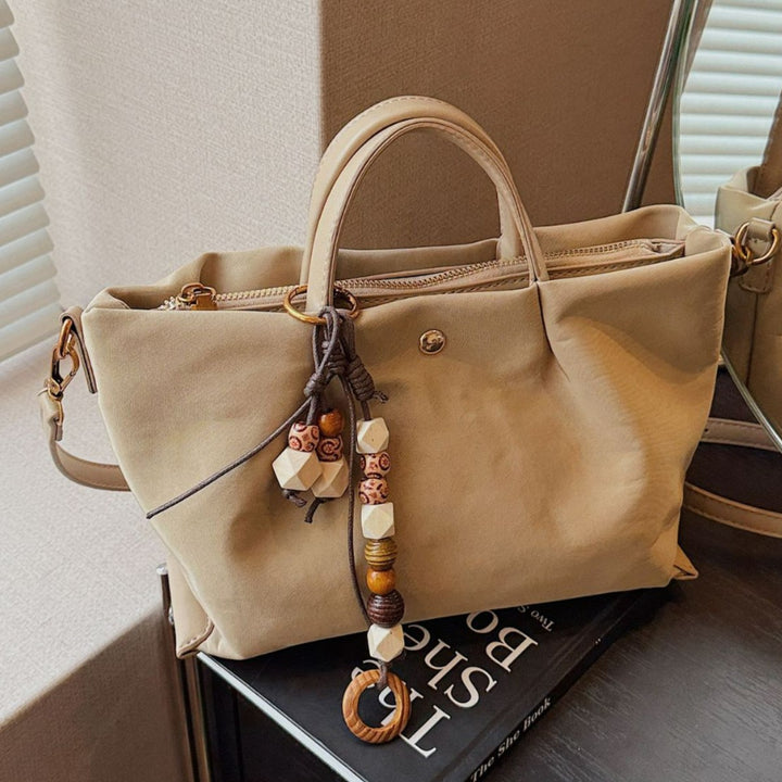 Damen elegante Umhängetasche mit charmantem Dekor Nord Taschen