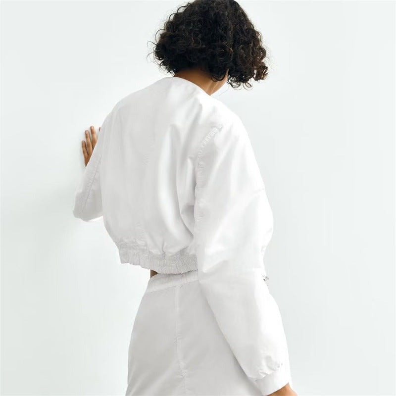 Damen Kurze Cropped-Bomberjacke aus leichtem Windbreaker‑Material mit Rippbündchen und seitlichen Einschubtaschen Nord Taschen