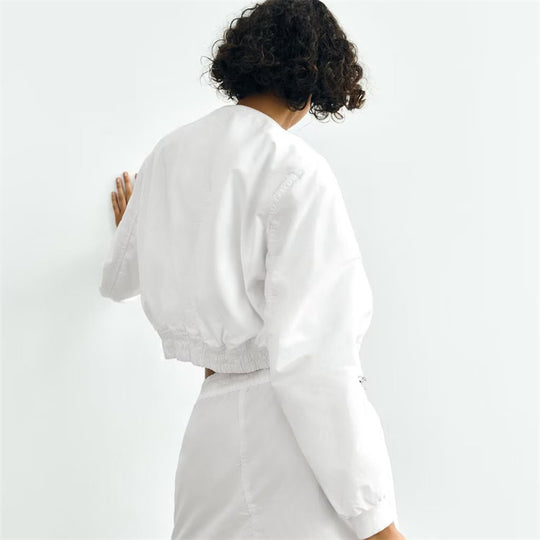 Damen Kurze Cropped-Bomberjacke aus leichtem Windbreaker‑Material mit Rippbündchen und seitlichen Einschubtaschen Nord Taschen