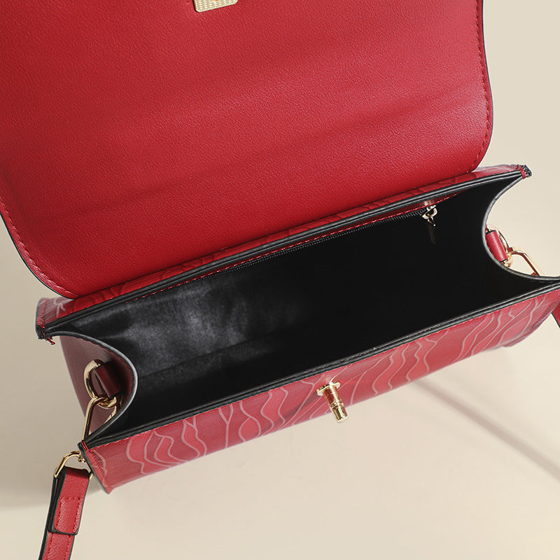 Damen Handtasche mit eleganter Wellenstruktur und goldener Schnallenakzent Nord Taschen
