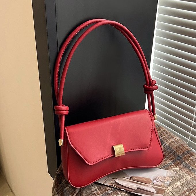 Damen Umhängetasche mit verstellbarem Tragegurt und eleganter Schnappverschluss Nord Taschen