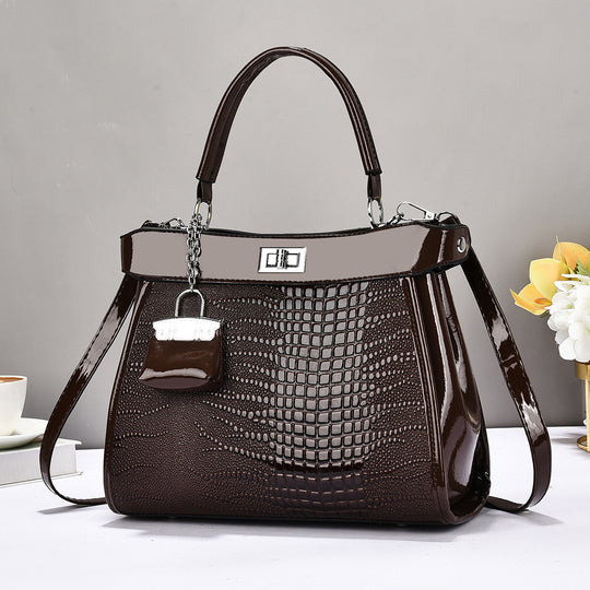 Damen Handtasche mit glänzender Krokodil-Prägung und abnehmbarer Mini-Clutch Nord Taschen