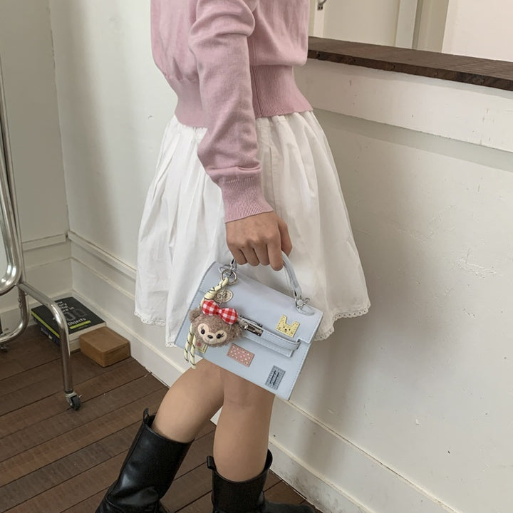 Damenhandtasche mit verspieltem Design und abnehmbarem Anhänger Nord Taschen