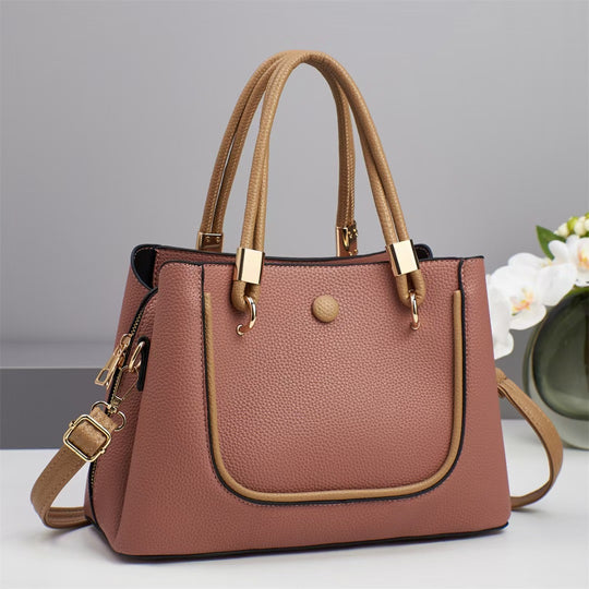 Damen Handtasche mit goldenen Akzenten und eleganter Struktur Nord Taschen