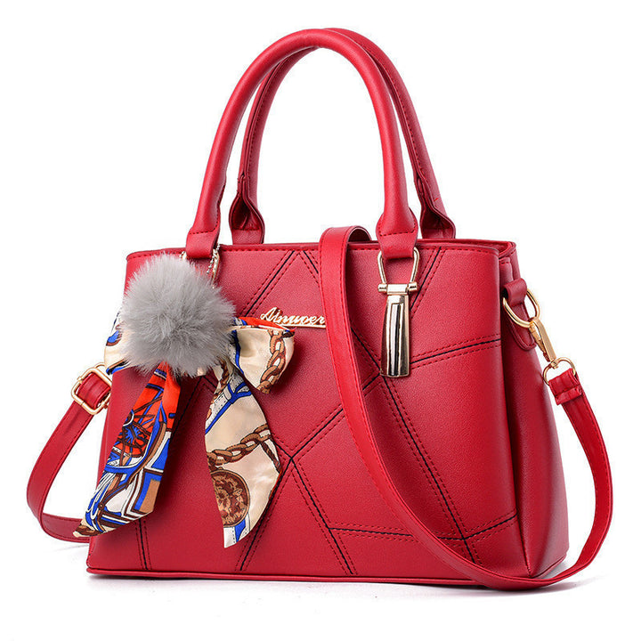 Damen Handtasche mit elegantem geometrischem Design und verspieltem Schal Nord Taschen