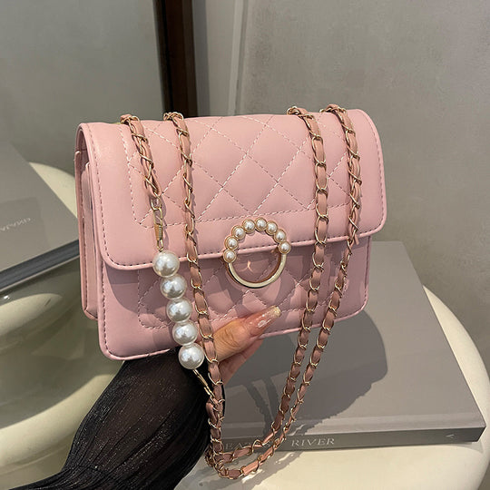 Damen elegante Umhängetasche mit strukturiertem Obermaterial und goldener Verzierung Nord Taschen