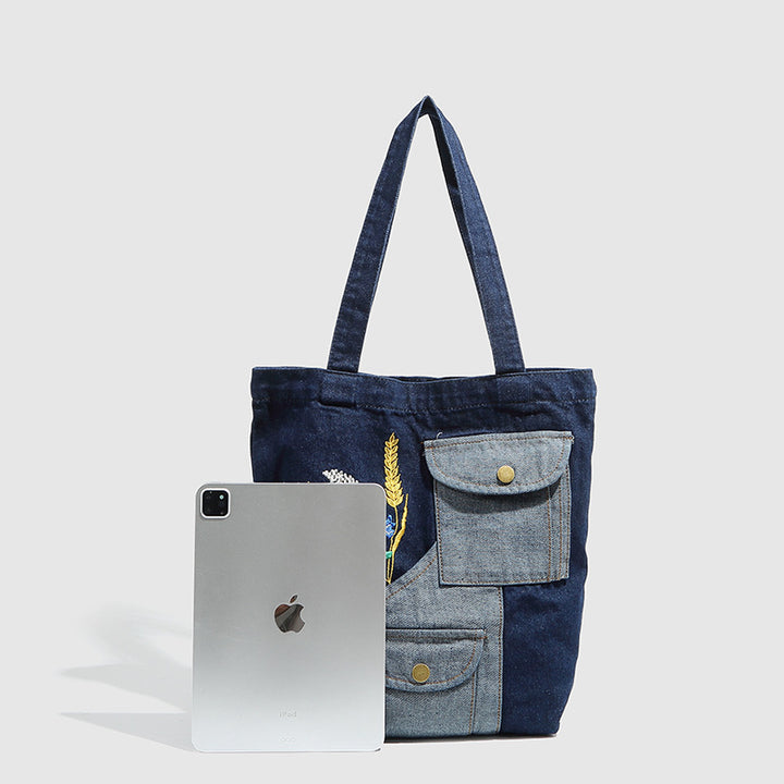 Damen Einkaufstasche mit floralem Stickmotiv und praktischen Außentaschen Nord Taschen