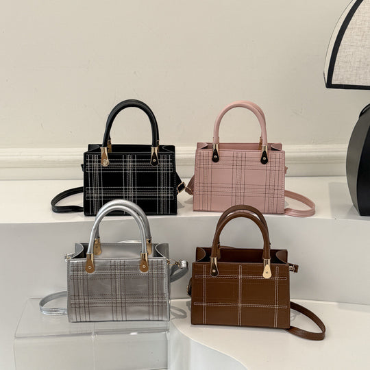 Damen Mini-Handtasche mit eleganter Struktur und goldenen Akzenten Nord Taschen