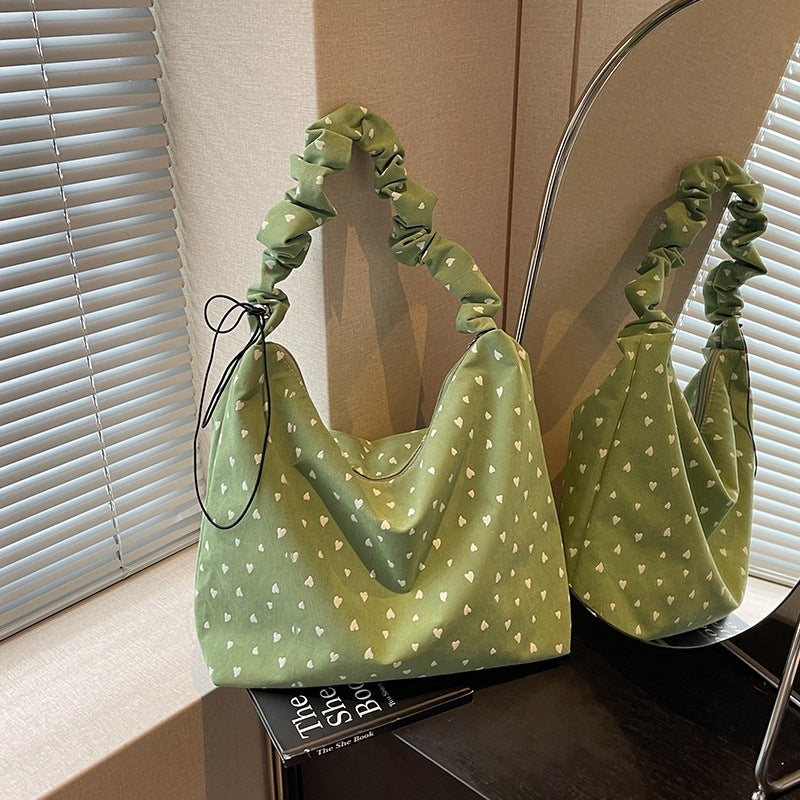 Damen Hobo-Tasche mit verspieltem Herzdesign und elastischen Trageriemen Nord Taschen