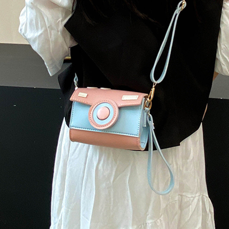 Damen Mini-Handtasche mit verspieltem Klappverschluss Nord Taschen