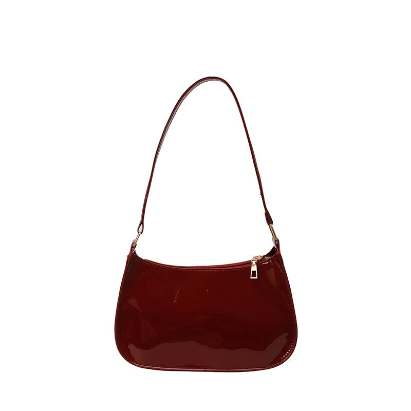 Damen Umhängetasche aus glänzendem Material mit elegantem Design Nord Taschen