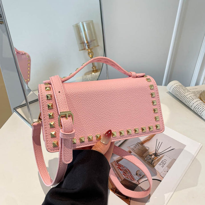 Damen Mini-Handtasche mit glitzerndem Obermaterial und goldenen Nieten Nord Taschen