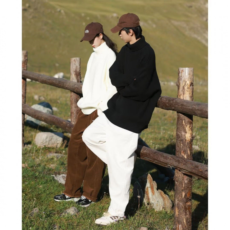 Damen Oversize-Rollkragenpullover aus weichem Baumwollmix mit gerippten Bündchen und verlängertem Saum Nord Taschen