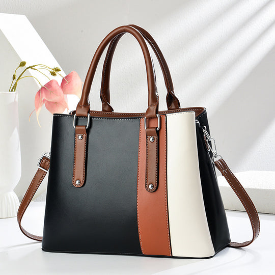 Damen Handtasche mit eleganten Farbakzenten und vielseitigem Tragegurt Nord Taschen