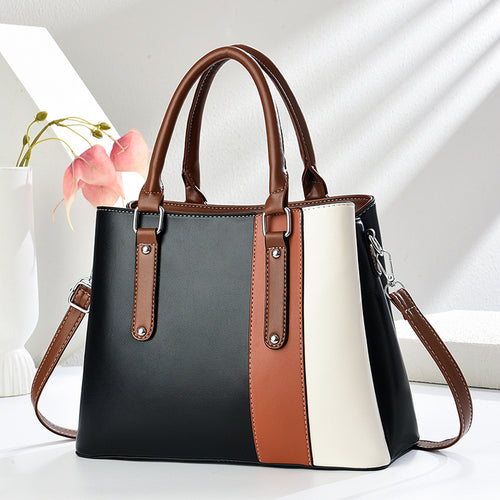 Damen Handtasche mit eleganten Farbakzenten und vielseitigem Tragegurt Nord Taschen