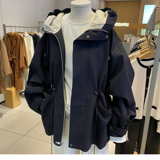 Damen Oversize-Kapuzenjacke mit Tunnelzug, Pattentaschen und Zwei-Wege-Reißverschluss Nord Taschen
