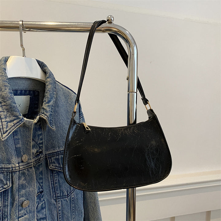 Damen elegante Umhängetasche aus veganem Leder mit minimalistischer Form Nord Taschen