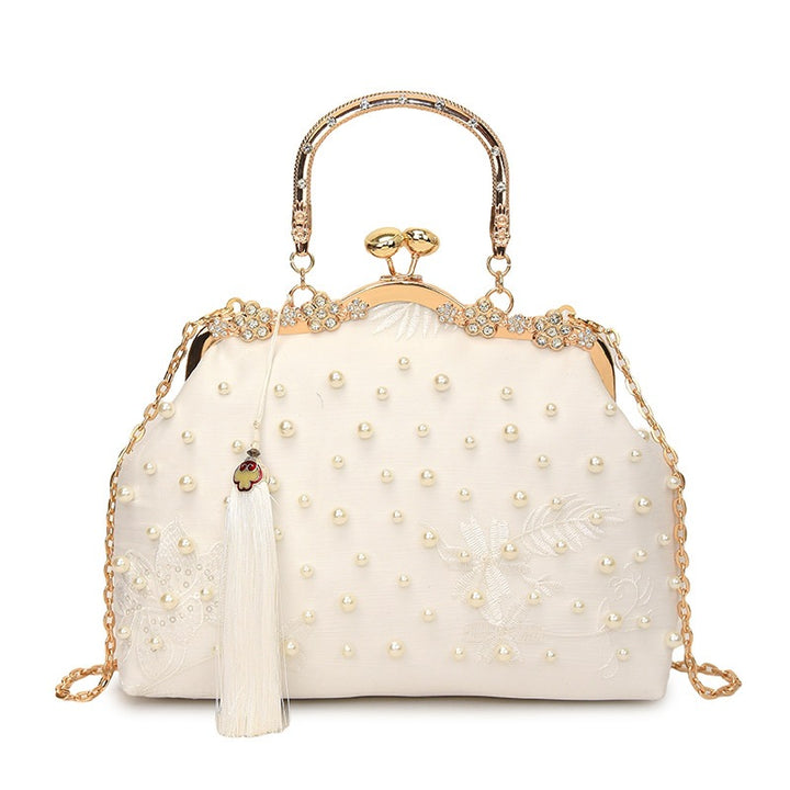 Damen elegante Handtasche mit perlenverziertem Design und Metallakzenten Nord Taschen