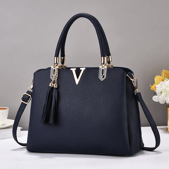 Damen Designer-Handtasche mit eleganter Quaste und abnehmbaren Schulterriemen Nord Taschen