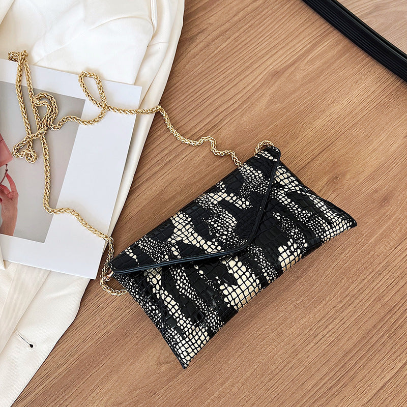 Damen elegante Clutch im schimmernden Krokodil-Look Nord Taschen