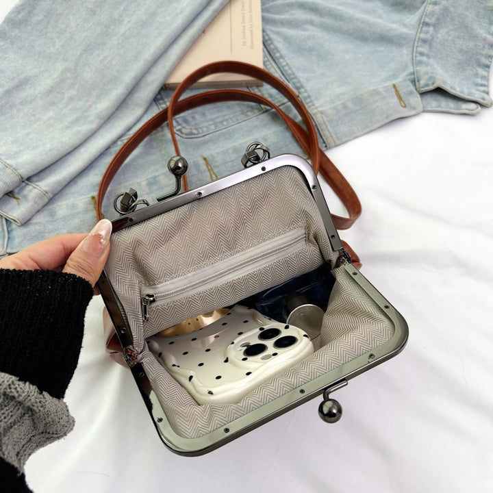 Damen elegante Handtasche mit robustem Metallverschluss Nord Taschen