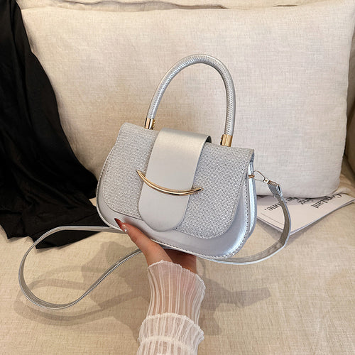 Damen elegante Umhängetasche mit schimmerndem Obermaterial und goldenen Akzent Nord Taschen