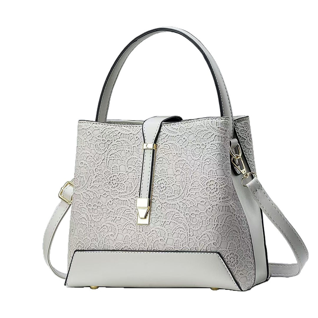 Damen elegante Handtasche mit filigranem Spitzenmuster Nord Taschen